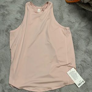 NWT. pink lululemon all tied up tank. size 8.